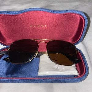 Gucci squared aviators.